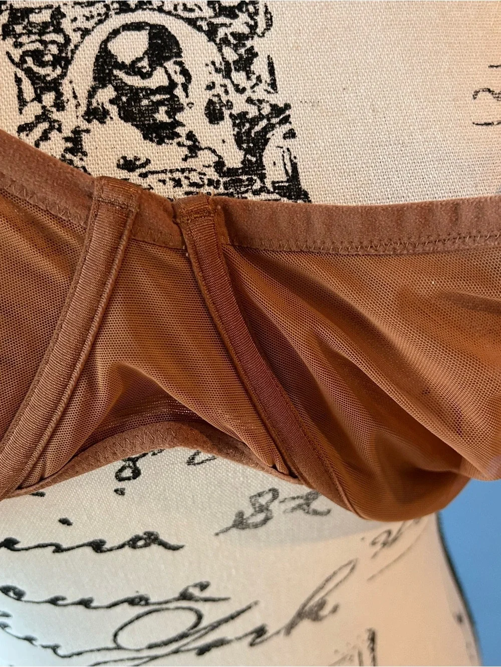 SKIMS Ultra Fine Mesh underwire bra in bronze.